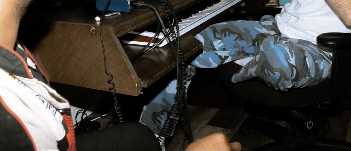 Smile Now / Cry Later homepage — recording studio session booking with artist photography